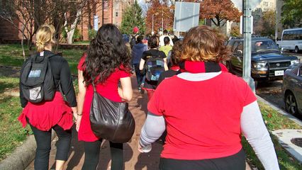 Marching from Thomas Circle into Luther Place for lunch and a People's Forum.