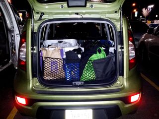 Grocery stop in Manassas on December 1, 2013, on the way home from my parents' house after celebrating Thanksgiving.  The back is filled with laundry, groceries, and various other odds and ends.