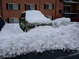 On February 12, the biggest snowfall of the year began, which ended up dropping around a foot of snow.  I couldn't get a spot next to my building before the storm, so I parked across the lot.  After the snow ended, I went to work digging myself out.