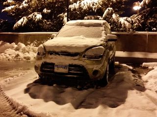 On March 5, it snowed while I was out driving the bus.  When I came back, my car was covered in snow.