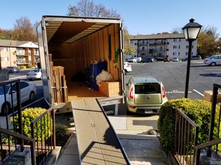 November 16 was moving day.  The movers parked their truck right next to the Soul, still in her reserved space.  They never asked me to move the car, because I otherwise would have.  They just parked their truck next to it.
