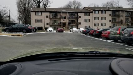 On December 31, I made a final visit to my old apartment in order to do a walkthrough to make sure that everything was as I wanted to leave it, and then turn in the keys.  I got a final photo of the Soul in my reserved parking space, in front of the leasing office, and then leaving for the final time.