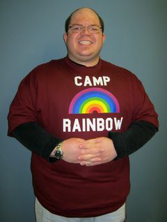 Arrival of my "Camp Rainbow" shirt. This shirt is a 4X, and it was actually bordering on being a little snug in this photo.