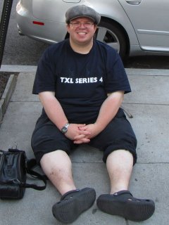 Sitting on the sidewalk in Dupont Circle (top), after having just walked from the White House to Union Station (and then taking the Metro back around). My pants are rolled up because my heels had become irritated from all the walking (almost two miles!), and both the back straps on my Crocs and my pantlegs were aggravating it. So I moved both out of the way (below). I looked ridiculous, but I also didn't care.