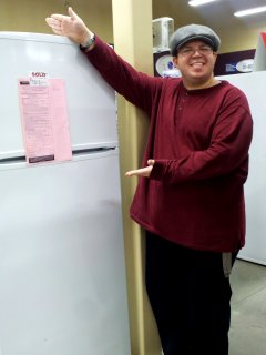 Showing off the new work refrigerator. This was the trigger for the realization that while I had gotten pants that fit better, my shirts were now also comically too large and needed to be replaced with smaller sizes.