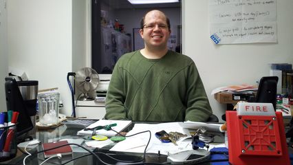 Wearing a sweater that fit and smiling while my office Mac got serviced for a moment. Interestingly enough, when I posted this photo on Facebook, the discussion quickly centered around fire alarms due to the presence in the photo of the Wheelock 7002T that lives on my desk. This was much to the surprise of a coworker who commented prior to when the discussion about alarms began.