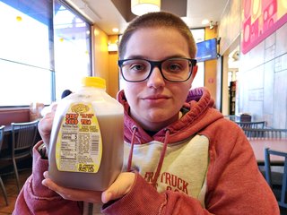 Elyse and I love these quart-size milk jugs because of their squat shape, and we were just tickled to find them here, selling tea.