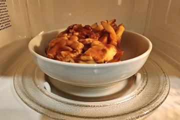 Nothing says "good morning" quite like reheated poutine.  Elyse complained that I had nuked my poutine, because, apparently, you just don't reheat french fries.  I simply responded, "Good thing you're not the one eating it."  I enjoyed it, even if it wasn't the healthiest breakfast.