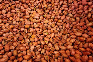 Red-dyed pistachios.  This was my first time seeing pistachios that had been dyed red.  The practice of coloring pistachios red, intended to hide stains caused by older harvesting methods, had largely gone out of style by the nineties as harvesting methods evolved that prevented these stains from occurring.  Most pistachios that you see nowadays are the seed's natural color.