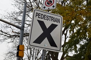 "Pedestrian X" (i.e. pedestrian crossing) signage on Victoria Avenue.