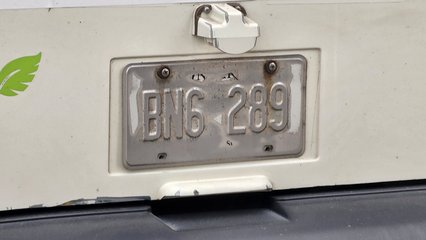 I also couldn't help but notice the license plate on the bus, where the reflective coating had almost completely worn away.  Clearly, for the license plate to be in that rough of shape, that bus had been around a while.