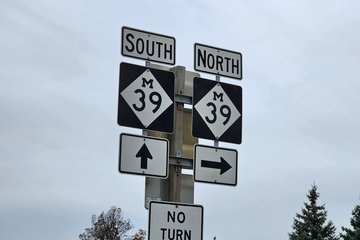 An example of Michigan state route shields, near The Henry Ford.  The shield consists of a diamond with an "M" at the top.