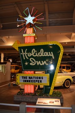 Holiday Inn Great Sign from 1960, the centerpiece of an exhibit that included a replica of a Holiday Inn guest room from the same period.