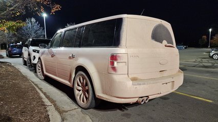 We all took a look at this Ford Flex out in the parking lot as we were leaving, and we all were left wondering how a car could get this filthy on just one side like that.