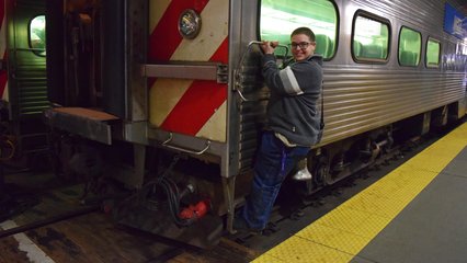 Elyse poses for a quick photo on the side of the train that we arrived on.