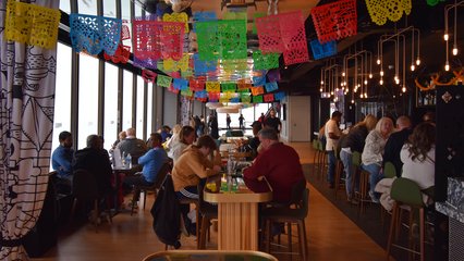 The bar at the Hancock Center observatory, decorated for Day of the Dead.