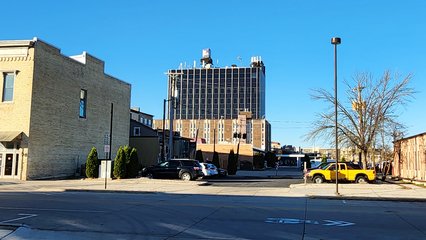 The high-rise building in the background, home to the siren that Elyse spotted.