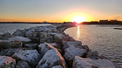 The jetty.  I clearly had my work cut out for me, as it was made entirely out of boulders, i.e. big rocks with lots of gaps and uneven surfaces.  But when you're trying to get a $1,000+ piece of equipment back, you do what you have to do.