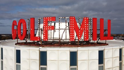 Rooftop sign at Golf Mill Shopping Center.