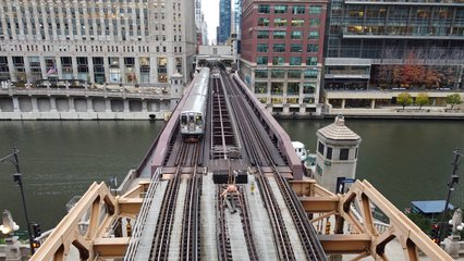 A Purple Line train crosses the Chicago River.