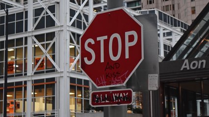 Stop sign with graffiti on it.  Admittedly, that "stop and kiss" graffiti was kind of cute.