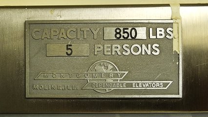 Builder's plate and inspection certificate for the elevator at a different building at Sherman Garden.