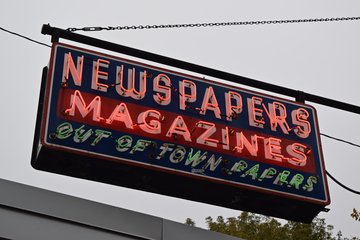 Sign for Chicago-Main Newsstand.  Gotta love a vintage neon sign.