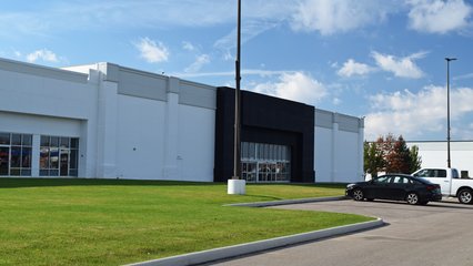 A vacant space which originally housed a Circuit City, and later was home to a Bottom Dollar store.