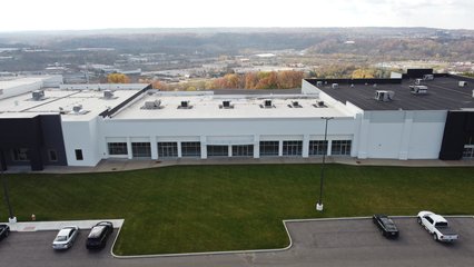 A row of smaller tenant spaces, still vacant.