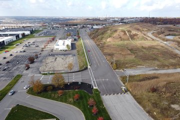 Transportation Boulevard, which is barricaded just beyond the entrance to the retail portion of the property.  The road continues for about 500 feet beyond the barricade, but there is nothing to access beyond the barricade.