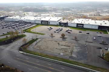 This appears to be the site of a never-built outparcel building of some sort, likely to house multiple small tenants.