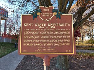 Historical marker memorializing the site of the shootings.