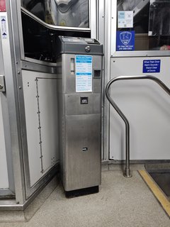 GFI farebox on car 827A.  While we entered through fare control gates, presumably, not every station has this - thus the farebox.