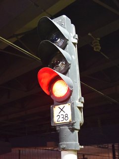 Three-aspect GRS/Alstom signal head at East 55th Street, displaying a red aspect.  I have no idea how Cleveland RTA's signaling system works, but I would love to find out.