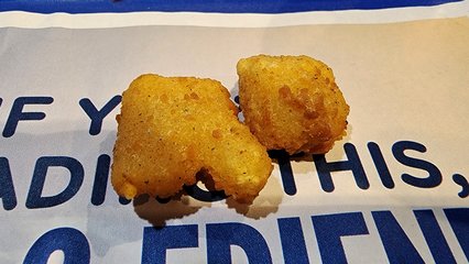 I noticed these two cheese curds next to each other, and the first thing that came to my mind that they looked like the 1980s-era TVOntario logo.