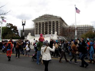 The exterior of the Supreme Court Building was under renovation at the time of the demonstration. The scaffolding normally was covered by a picture of the building, but presumably due to Hurricane Sandy, which came through four days prior to this event, this covering was missing.
