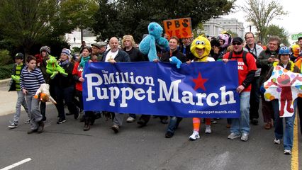 The march heads north on First Street NE.