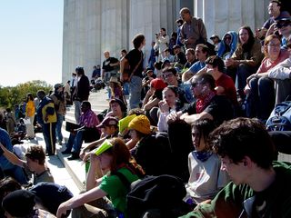 The steps of the Lincoln Memorial were no less than packed, with all sorts of people parked to hear the speakers just in front of them. From this location, however, it was difficult to actually see the speakers, due to the presence of a large banner in front of us.
