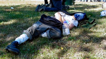 Even with all the events going on, some people just pulled their bandanna up over their eyes and took a nap.