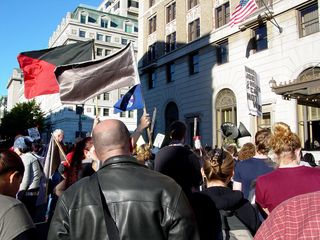 All sorts of people - young, old, male, female, masked, unmasked, some carrying signs, some carrying flags - participated in the march to the hotel, and then at the rally in front of the hotel.