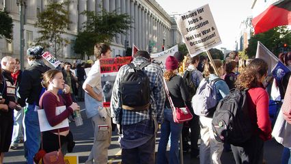 All sorts of people - young, old, male, female, masked, unmasked, some carrying signs, some carrying flags - participated in the march to the hotel, and then at the rally in front of the hotel.