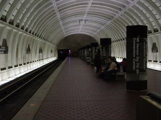 Inside the Mt. Vernon Square station, I ran into some of the radical cheerleaders, still dressed for protest (note the pink leggings).