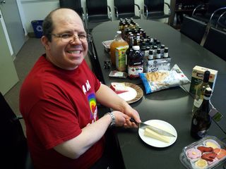 Getting ready for an office party, I sliced up a block of cheese. I described this photo as "Schumin cuts the cheese." Technically, that is an accurate description.