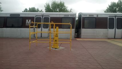 Platform reconstruction work underway at Takoma station. Note the hole where a pylon should be.