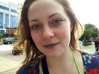 On May 19, I got together with my friend Melissa. We went deep water running at Germantown Indoor Swim Center, then hung out at Washingtonian Center for a while, where Melissa got a snow cone. This photo was to show Melissa how blue the food coloring in the snow cone had made her lips.