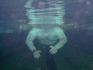 My friend Suzie, who swims with me at Olney on Wednesdays, wanted to give Duckie a spin at the pool one night, so I brought it along one night for her to take for a spin. This was one of the photos from that photo shoot, catching me mid-stroke doing the butterfly.