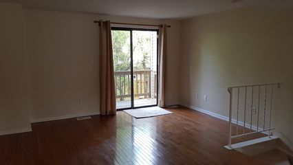 The kitchen, the living room, and master bedroom with mezzanine level.