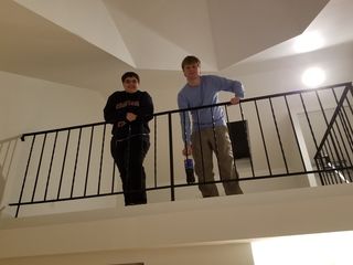 Brian later came over to see the place, and I got this photo of them looking down from the mezzanine.