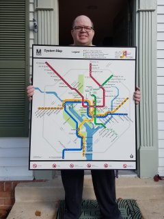 Bringing the big Metro map into the house, along with the other wallhangings, on the morning of November 13.