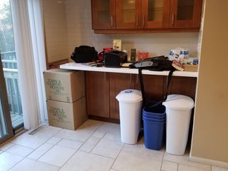 Boxes in the kitchen.  Getting the kitchen fully operational would be the first order of business for me after the movers left.  All dishes, glassware, and silverware would go through the dishwasher before being put away.